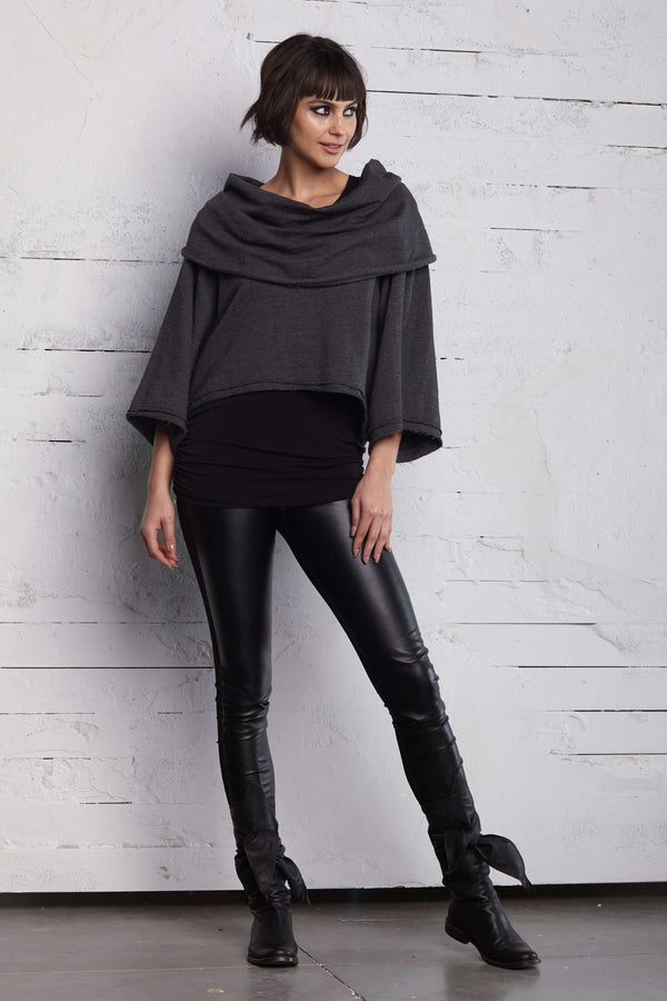 Fun dark gray cropped french terry sweater that can be worn off the shoulder or as a draped cowl neckline.  Layer with rouched tank top and leggings. Priced at $212.00.