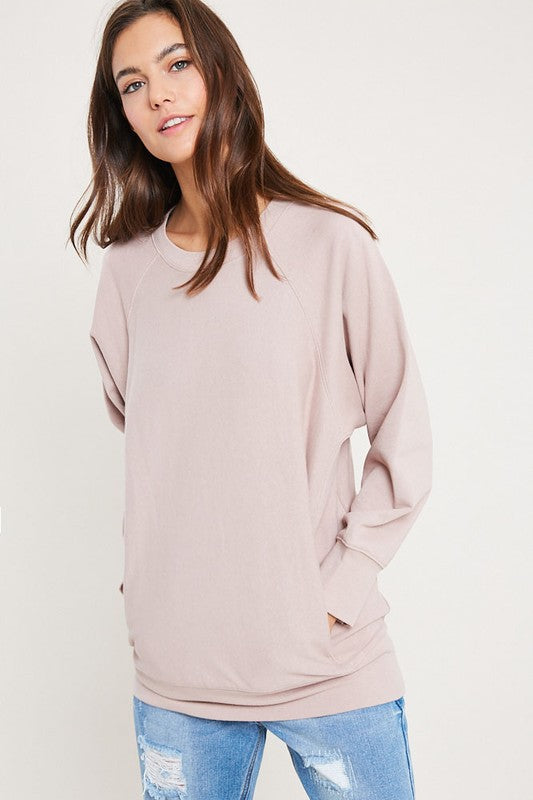 Ultimate weekend long crew neck sweatshirt with pockets.  Priced at $56.00. 