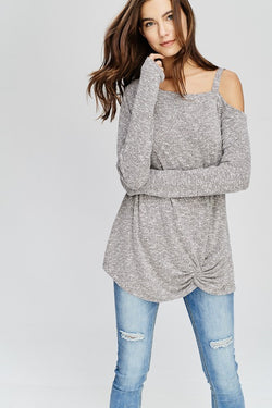 Ultra soft long sleeve asymmetrical twisted hem brushed two-tone knit sweater.  Will fast become one of your favorite tops. Priced at $40.00.