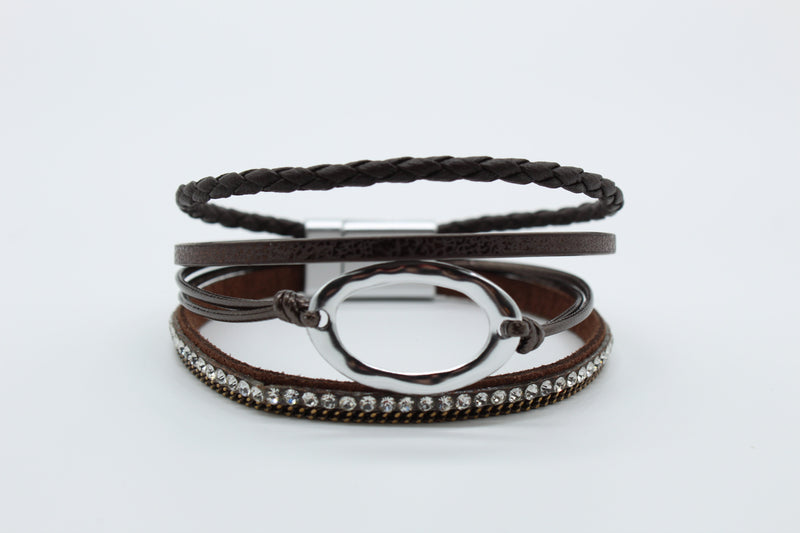 Bracelet - Brown Thin Magnetic with Silver Hoop. Four brown vegan leather straps with a silver hoop.  Priced at $13.00.